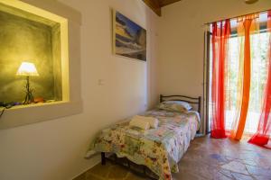 Posteľ alebo postele v izbe v ubytovaní Su La Strata Villa by CorfuEscapes