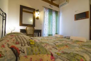 Posteľ alebo postele v izbe v ubytovaní Su La Strata Villa by CorfuEscapes