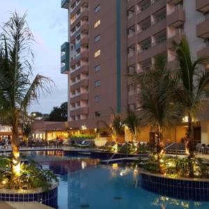 Bazén v ubytování ENJOY OLIMPIA PARK - 2dormitórios - Park Resort - Hospede-se em frente ao Park no melhor Resort de Olimpia nebo v jeho okolí