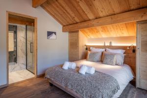 Postel nebo postele na pokoji v ubytování Chalet Dibona