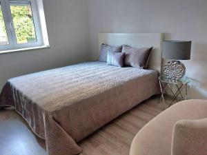 Llit o llits en una habitació de Casa Oasis