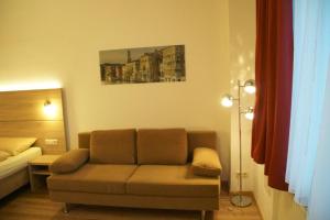 Гостиная зона в Das Falk Apartmenthaus