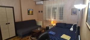 Ένα ή περισσότερα κρεβάτια σε δωμάτιο στο Apartman Valdano