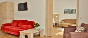Posezení v ubytování Das Falk Apartmenthaus