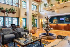 a living room with a fountain in the middle at Quality Suites Downtown San Luis Obispo in San Luis Obispo