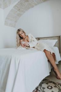 Voodi või voodid majutusasutuse al 22 Suite & Spa Luxury Experience toas