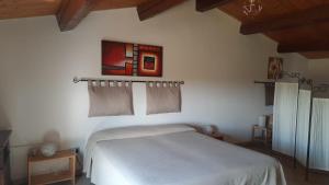 Postel nebo postele na pokoji v ubytování B&B Palatium S.G.