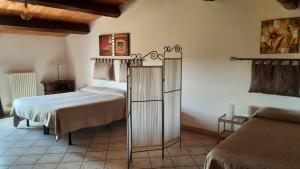 Postel nebo postele na pokoji v ubytování B&B Palatium S.G.