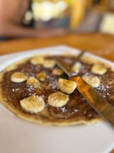 a pancake with peanut butter and bananas on it at Big Dune camp in Nuweiba