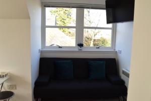 Posezení v ubytování Cosy self-contained flat in Kirriemuir
