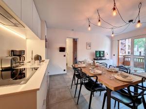 Kuchyň nebo kuchyňský kout v ubytování Appartement moderne 2P · 6 pers · Proche des pistes · Balcon-Sud/Ouest - FR-1-344-819 + 9 fotografií