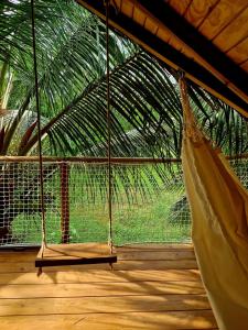 Balkón nebo terasa v ubytování PURA VIDA Lodge Cabane perchée