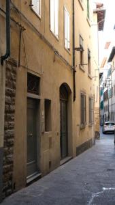 a building with two doors on the side of a street at Ludo’s Home in Florence