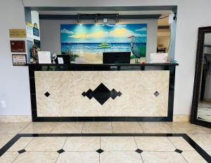 The lobby or reception area at Days Inn by Wyndham Fort Walton Beach