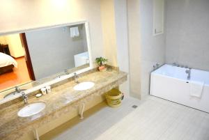 Bagno di GreenTree Inn JiangSu WuXi YiXing East LongTan Road DongJiu Business Hotel
