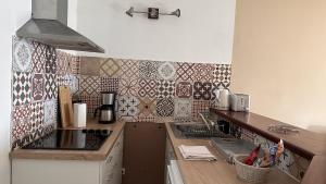 Кухня или кухненски бокс в Indigo, Anse Mitan, beau F2 sublime vue mer, proche plage