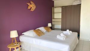 Легло или легла в стая в Indigo, Anse Mitan, beau F2 sublime vue mer, proche plage