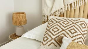 Una cama o camas en una habitación de Soley ka Chofé, Anse Mitan, Sublime T3 refait à neuf vue mer