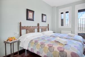 Posteľ alebo postele v izbe v ubytovaní Apartamento Resil Ronda