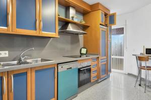 Kuchyňa alebo kuchynka v ubytovaní Apartamento Resil Ronda