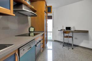 Kuchyňa alebo kuchynka v ubytovaní Apartamento Resil Ronda