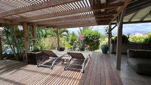 Balkón nebo terasa v ubytování Villa Ty Natur T5, espace, calme, verdure, vue mer