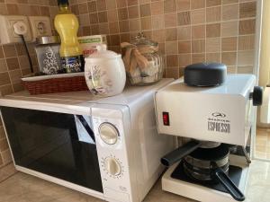 Kuchyň nebo kuchyňský kout v ubytování Levendula Apartmanház