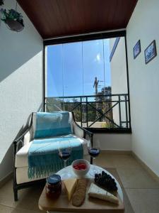 Krevet ili kreveti u jedinici u okviru objekta Apartamento encantador a 800m da Praça do Capivari +15 fotografija