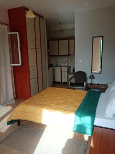 Ένα ή περισσότερα κρεβάτια σε δωμάτιο στο jusmine apartments