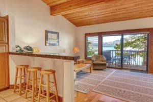 a kitchen and living room with a view of the ocean at Our Lake House in Zephyr Cove