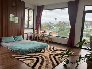 Postel nebo postele na pokoji v ubytování Hoshi DaLat House