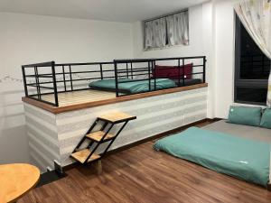 Postel nebo postele na pokoji v ubytování Hoshi DaLat House