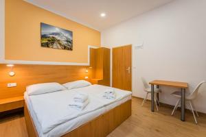 Posteľ alebo postele v izbe v ubytovaní Rabie Aparthotel