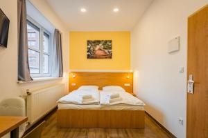 Posteľ alebo postele v izbe v ubytovaní Rabie Aparthotel