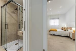 Koupelna v ubytování CMDreams Platinium- Apartamentos turísticos en el centro de Mérida + 166 fotografií