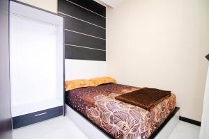 Tempat tidur dalam kamar di Villa Woody with Private Pool & Rooftop