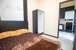 Tempat tidur dalam kamar di Villa Woody with Private Pool & Rooftop