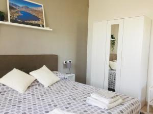 Postel nebo postele na pokoji v ubytování CountryHome - Casale 32 - Intera Villa