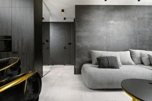 Χώρος καθιστικού στο Black&Gold Apartament