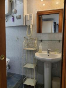 Kúpeľňa v ubytovaní Albergo Avalon + 37 fotografií