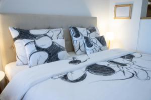Krevet ili kreveti u jedinici u okviru objekta Apartman Elle +21 fotografija