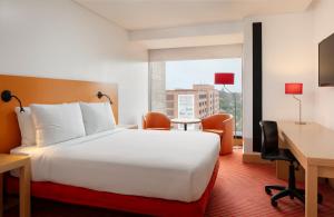 Voodi või voodid majutusasutuse Fairfield by Marriott Bogota Embajada toas