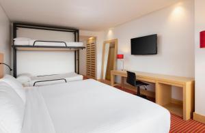 Voodi või voodid majutusasutuse Fairfield by Marriott Bogota Embajada toas