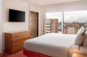 Voodi või voodid majutusasutuse Fairfield by Marriott Bogota Embajada toas