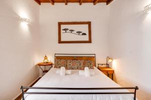 Giường trong phòng chung tại Casa do Tintejo +49 ảnh