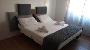 Ένα ή περισσότερα κρεβάτια σε δωμάτιο στο Carla's House +13 φωτογραφίες