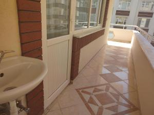 a bathroom with a sink and a tub at Large House in Trabzon