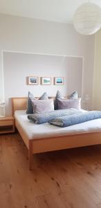 A bed or beds in a room at Panorama Erlebnis