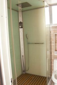 a shower stall in a bathroom with a toilet at apt duplex embajada americana corferias agora g12 in Bogotá