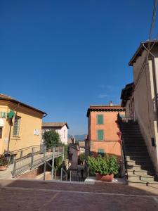 an empty street with stairs in an old town at CasaMicia in Gallese